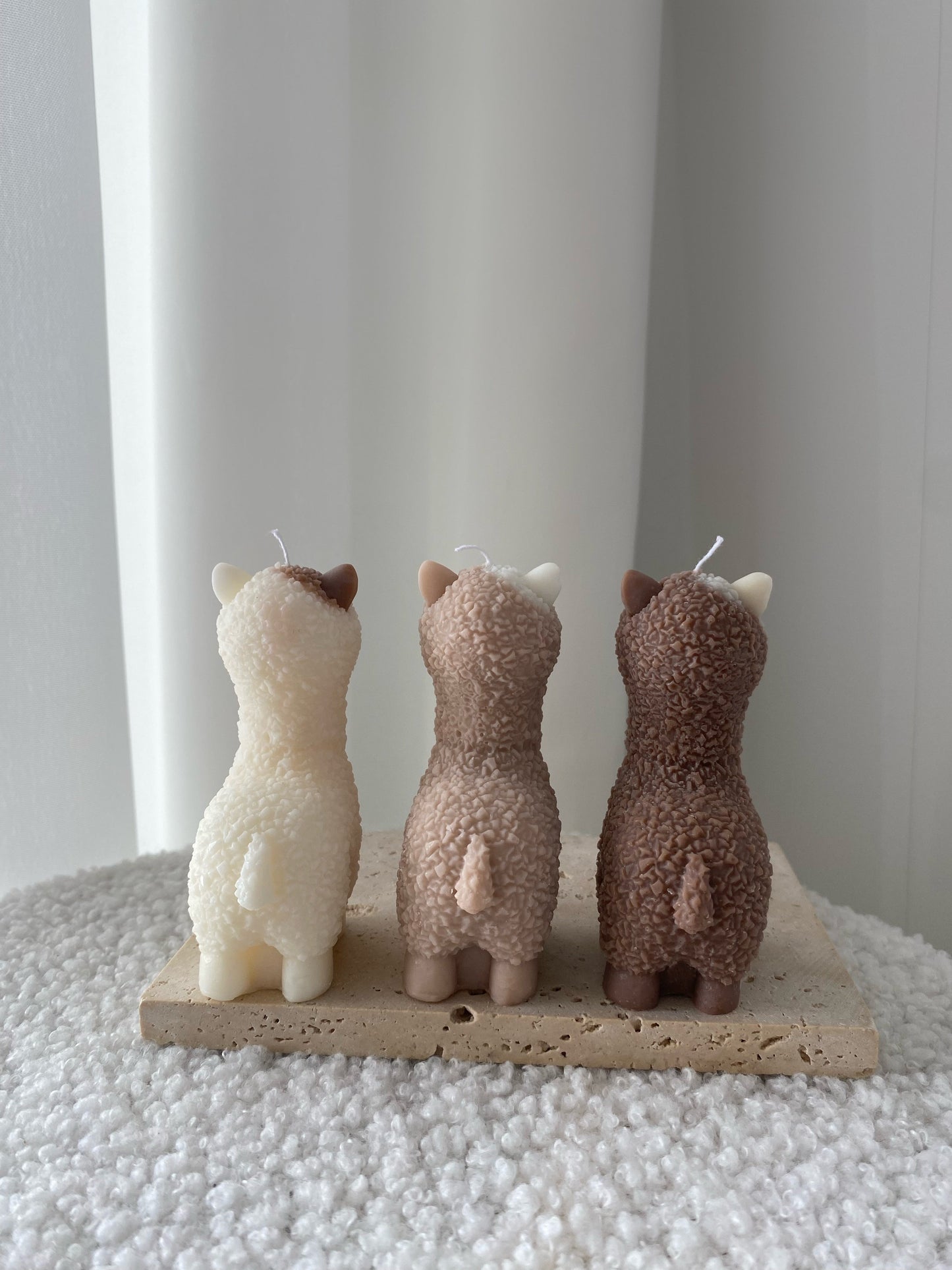 ALPACA LETTER on a candle